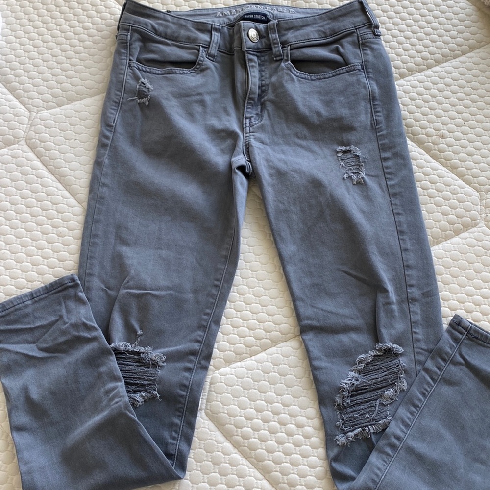 Gray ripped jeans